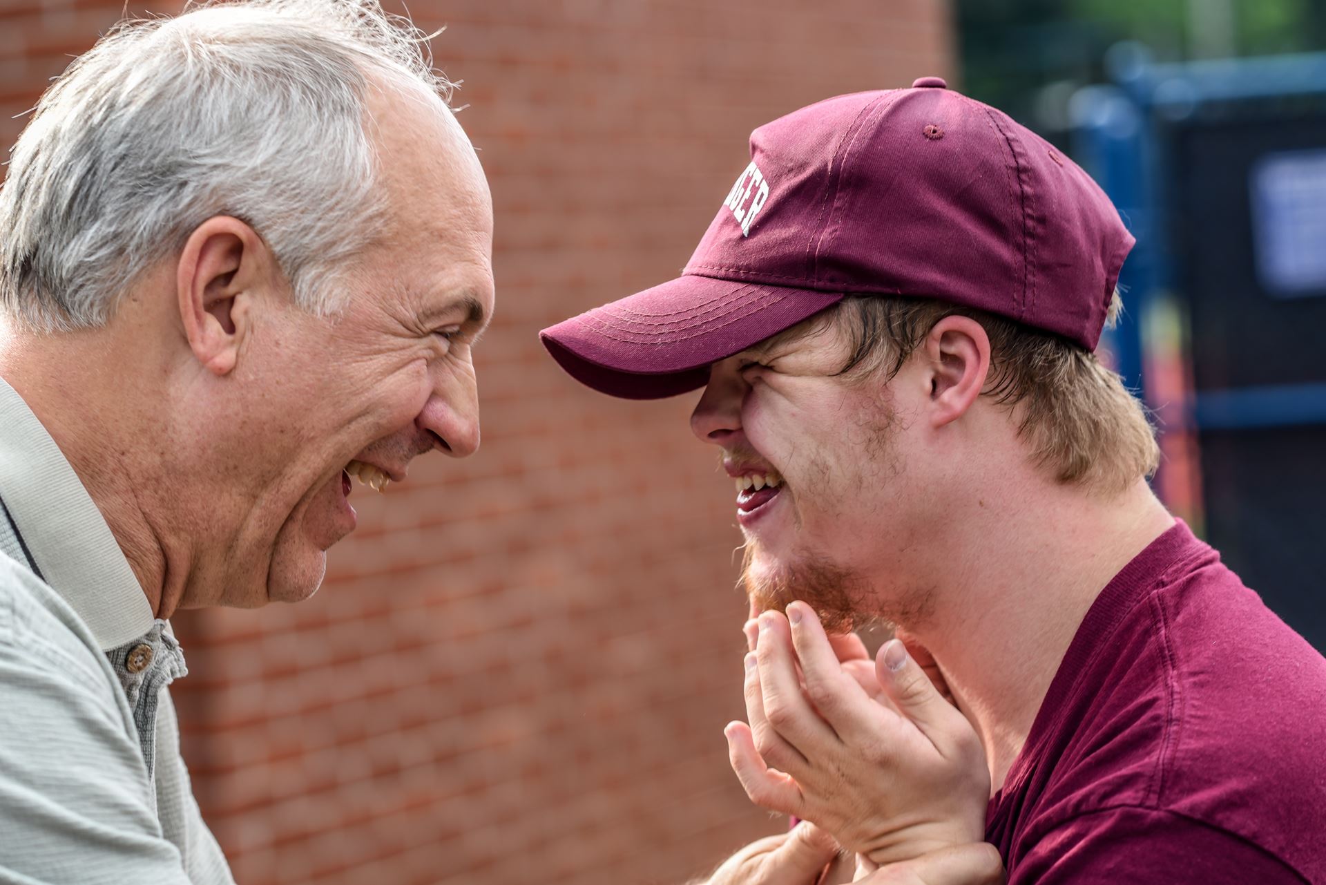 Two men laughing